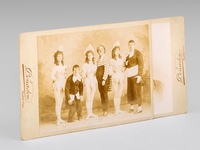2 photos anciennes d'une troupe de 3 clowns accompagnés de 3 jeunes femme (écuyères ou trapézistes ?). L'une dédicacée au verso : 'A mon cher ami Adrien Robert Bordeaux le 28 mars 1897' signée : 'Alfred Tro