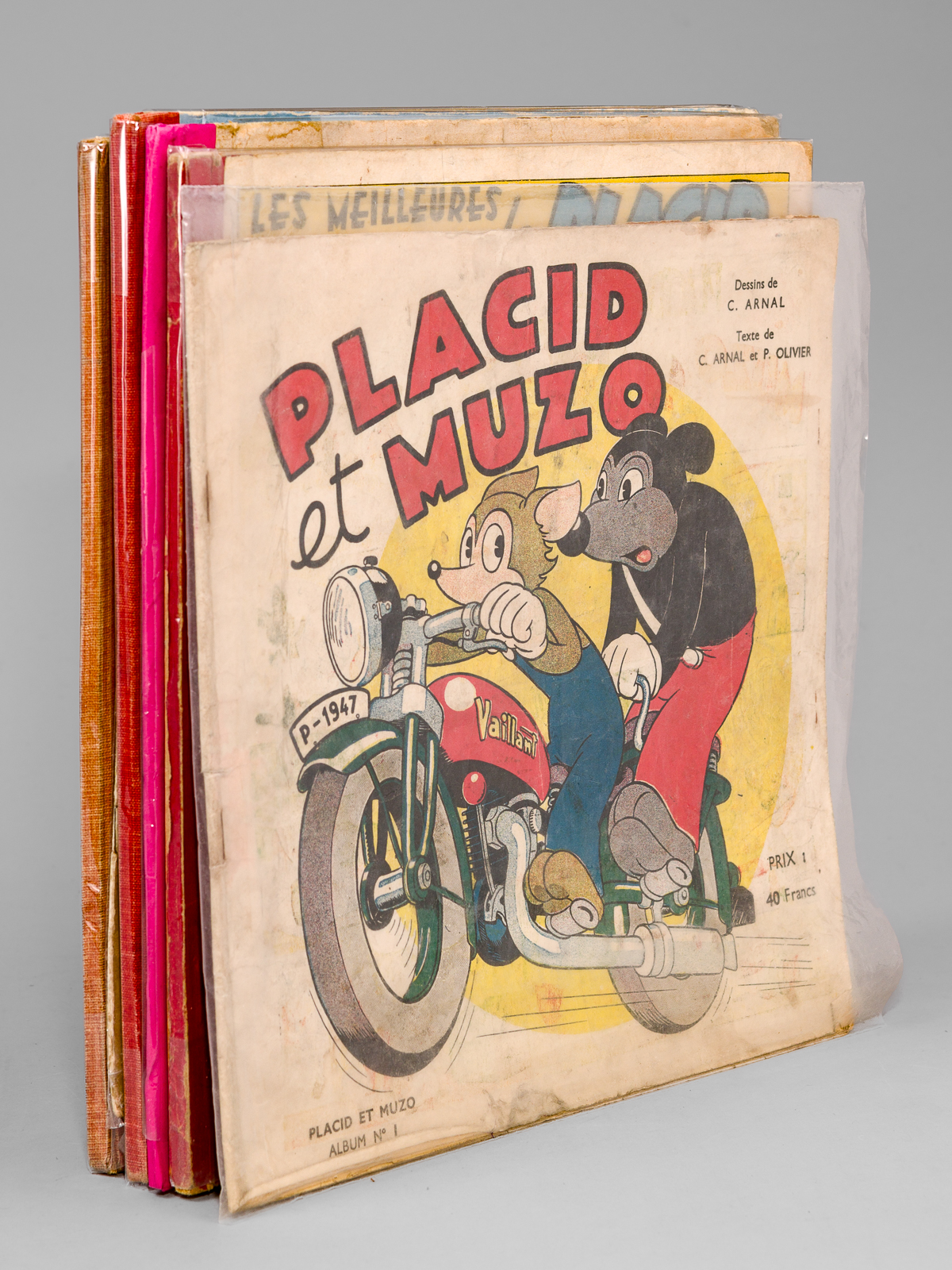 photo n°10 : [ Lot de 6 albums en édition originale ] N° 1 : Placid et Muzo, 1947 ; N° 2 : Les Meilleures Histoires de Placid et Muzo ; N° 3 : Les Aventures de Placid et Muzo ; N° 5 : Les Aventures de Placid et Muzo ; [ N° 7 : ] Placid et Mu